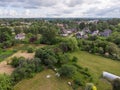 Areal drone view of suburbs and many private houses and gardens
