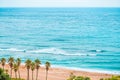 Areal shot of beautiful Jeju island sand beach with lots of enthusiastic surfers swimm Royalty Free Stock Photo