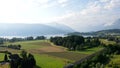 Areal shot of lake zug and rig over the golf course von HolzhÃÂ¤usern, Switzerland