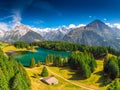 Areal view of Arnisee with Swiss Alps. Arnisee is a reservoir in the Canton of Uri, Switzerland, Europe
