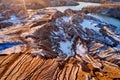 Areal view sandy hills lakes rivers terrain old sand mines covered with first snow Royalty Free Stock Photo