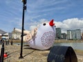 Areal view of a Solovey Bird perched on a railing in Liverpool, United Kingdom