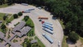 Areial view row of semi-trucks parked at highway Interstate 10 rest area, large trailer container parking spots stops near Royalty Free Stock Photo