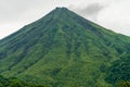 Arenal Volcano, which has an almost perfect cone shape, is one of the biggest tourist attraction in Alajuela, Costa Rica Royalty Free Stock Photo