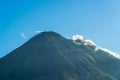 Arenal Volcano, which has an almost perfect cone shape, is one of the biggest tourist attraction in Alajuela, Costa Rica Royalty Free Stock Photo