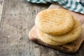 Arepas on wooden table. Venezuelan typical food