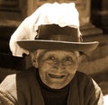 Portrait of Quechua old woman dressed in traditional clothing,