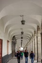 Arequipa/Peru - Sep.28.19: people walk in the corridor. Old architecture in the city center Royalty Free Stock Photo