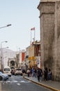 Arequipa/Peru - Sep.28.19: streetview of city downtown. People, cars and old architecture.