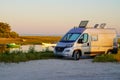 Fiat Ducato Campereve in sunset holidays motorhome and campervan parked by the sea side