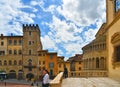 AREZZO, ITALY. Cityscape with Piazza Grande square in Arezzo with facade of old historical buildings and crowd of peopl