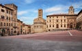 Arezzo, Tuscany, Italy: the main square Piazza Grande with the medieval church and buildings, in the old town of the ancient Royalty Free Stock Photo