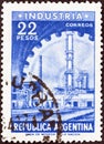 ARGENTINA - CIRCA 1954: A stamp printed in Argentina shows industry and cogwheel, circa 1954.