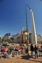 Argentina Corrientes Avenue and subway entrance obelisco with people drinking coffee in a city bar