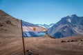 Argentina flag with Cerro Tolosa Mountain on background in Cordillera de Los Andes - Mendoza Province, Argentina Royalty Free Stock Photo