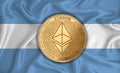 Argentina flag ethereum gold coin on flag background. The concept of blockchain bitcoin currency decentralization in the