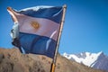 Argentina flag with Nevado Juncal Mountain on background in Cordillera de Los Andes - Mendoza Province, Argentina Royalty Free Stock Photo