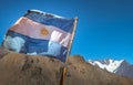 Argentina flag with Nevado Juncal Mountain on background in Cordillera de Los Andes - Mendoza Province, Argentina Royalty Free Stock Photo
