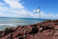 Argentina flag on a sea shore Royalty Free Stock Photo