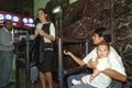 Portrait of begging mother with baby on train station Royalty Free Stock Photo