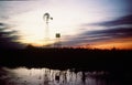 argentina sunset of a windmill in pampa argentina Royalty Free Stock Photo