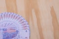 Argentine banknotes of 100 pesos on a table. Royalty Free Stock Photo