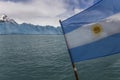 Argentine flag in Perito Moreno Glacier, Los Glaciares National Park, Santa Cruz Province, Royalty Free Stock Photo