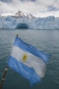 Argentine flag in Perito Moreno Glacier, Los Glaciares National Park, Santa Cruz Province, Royalty Free Stock Photo