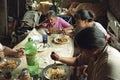 Argentinean family with only women is eating in slum