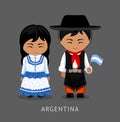 Argentines in national dress with a flag.