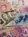 Argentinian banknotes of different denominations unorganized, background and texture