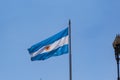 Argentinian flag waves in the wind in the historic center of Buenos Aires, Argentina Royalty Free Stock Photo