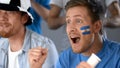 Argentinian football supporters celebrating national team success in competition Royalty Free Stock Photo