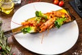 Argentinian king prawns, glazed. Lime, chilly and garlic. Served in a bottle. Delicious healthy traditional food closeup