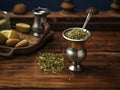 Argentinian mate tea in calabash gourd with bombilla stick. Generative AI