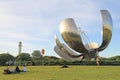 Argentinian People resting in the park with big flower sculpture Royalty Free Stock Photo