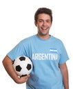 Argentinian soccer fan is happy about a goal Royalty Free Stock Photo