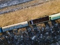 ÃÂ¡argo trains. Wagons with goods on railroad. Heavy industry. Industrial conceptual scene. Aerial. Top view. Vintage style