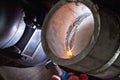 Argon arc welding of thick-walled stainless steel pipe Royalty Free Stock Photo