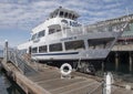 An Argosy Cruises ship preparing to be boarded at historic Pier 55 in Seattle, Washington. Royalty Free Stock Photo