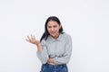 An argumentative and opinionated young woman vehemently opposing a proposal. Looking a bit offended. Isolated on a white Royalty Free Stock Photo