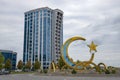 A crescent moon with a star on the city square. Argun, Chechen republic