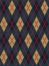 Argyle print. Seamless knitted pattern with yellow and black rhombuses on a dark green background Royalty Free Stock Photo