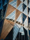 Arhitectural details made from glass and copper panels. Office building fasade close up