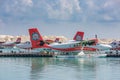 05.06.2018 - Ari Atoll, Maldives: Exotic scene with seaplane on Maldives sea landing. Vacation or holiday in Maldives concept back Royalty Free Stock Photo