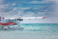 05.08.2018, Ari atoll, Maldives: Exotic scene with seaplane on Maldives sea landing. Vacation or holiday in Maldives concept