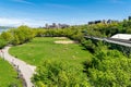 Arial view across Riverbank State Park in New York City, with Upper Manhattan and the George Washington Bridge in the