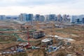 Arial view of a large construction site. Tower cranes in action. Housing renovation concept. Crane during formworks. Construction Royalty Free Stock Photo