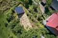 Arial view of male worker installing photovoltaic solar panel. Royalty Free Stock Photo