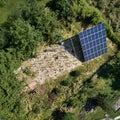 Arial view of male worker installing photovoltaic solar panel. Royalty Free Stock Photo